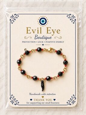 Gold Bracelet with Black Beads and Red Accents